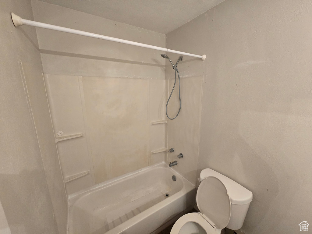 Full bath with shower / bathtub combination and toilet
