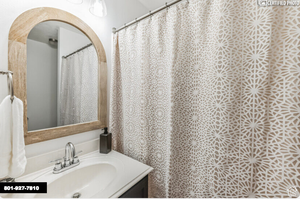 Full bathroom with vanity
