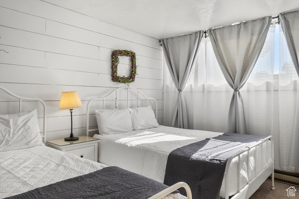Bedroom featuring baseboard heating