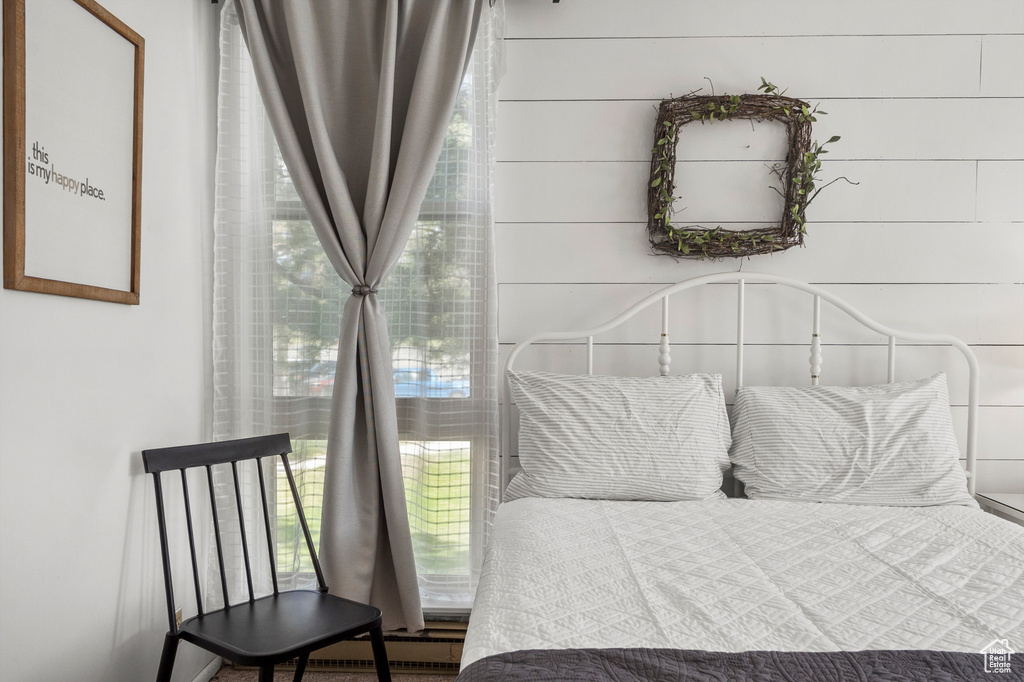 Bedroom with multiple windows