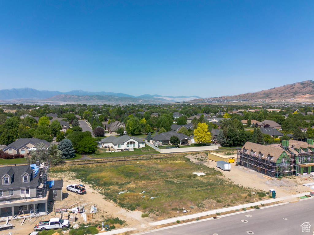 Aerial view of residential area with a mountain backdrop