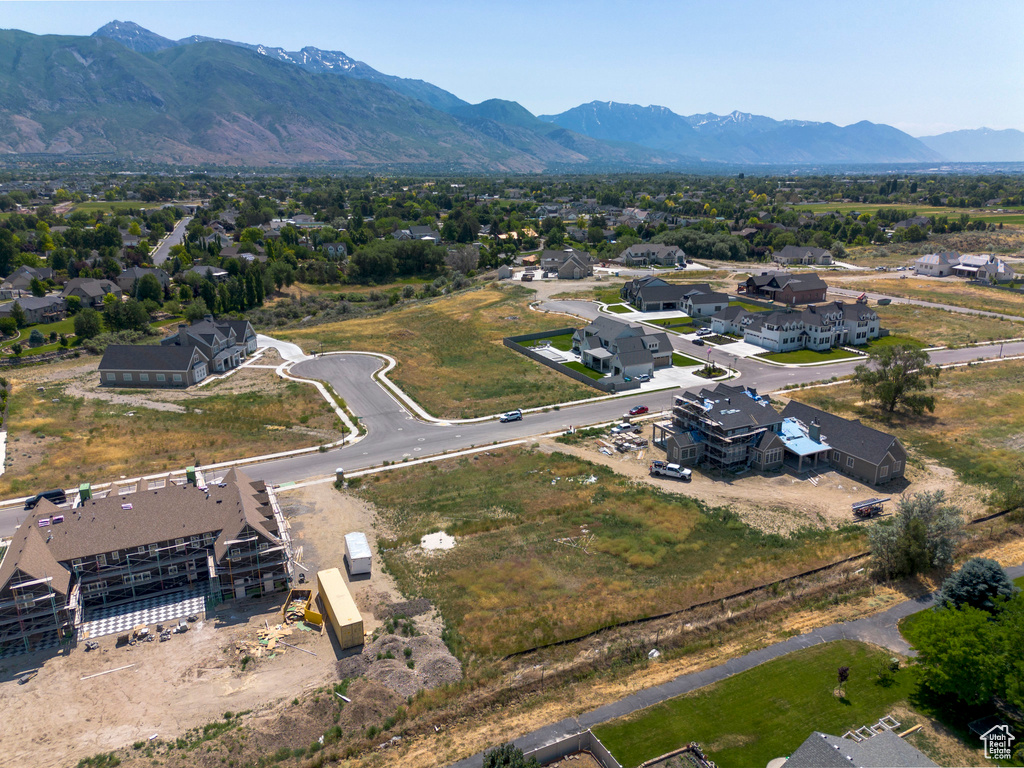 Aerial perspective of suburban area with a mountain backdrop
