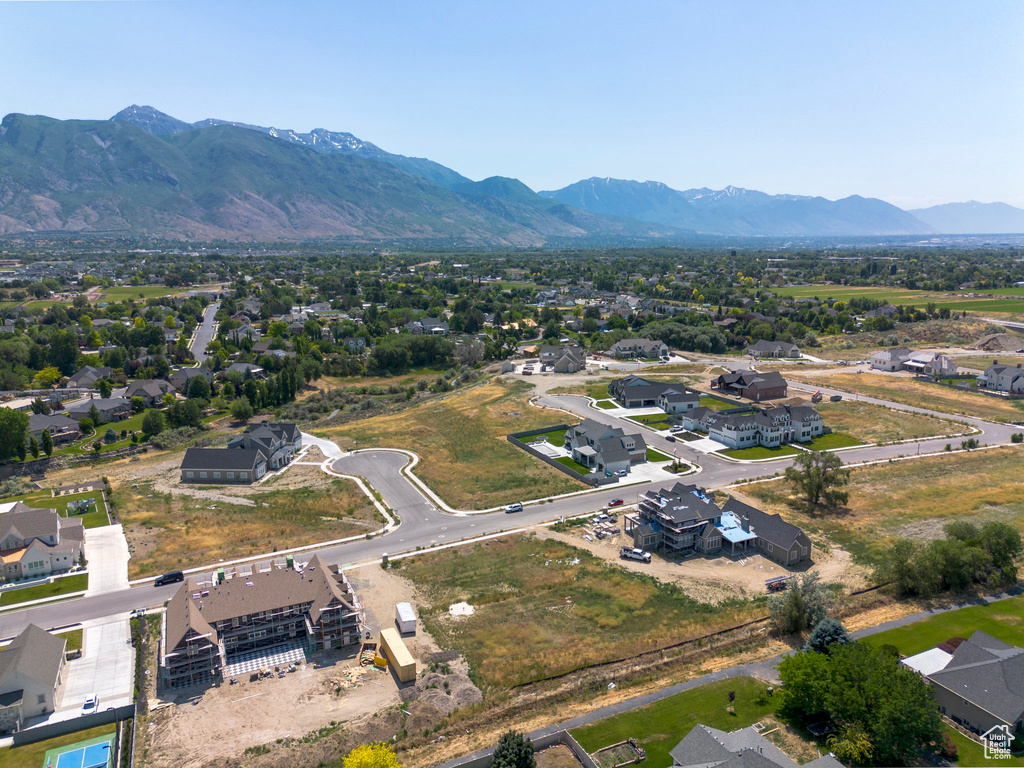 Aerial view of residential area featuring mountains