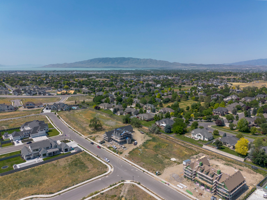 Aerial view of residential area with a mountainous background