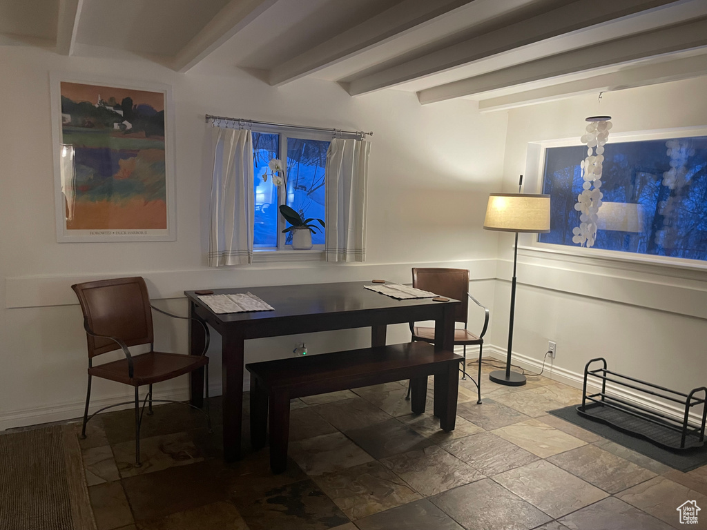 Dining area with beam ceiling