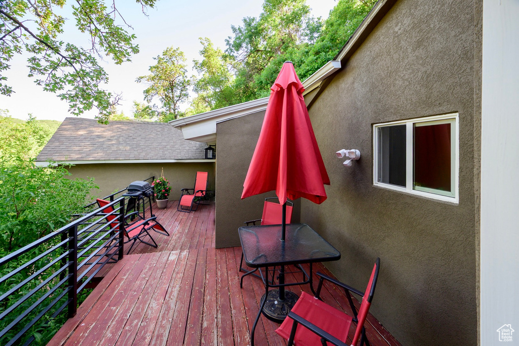 Wooden deck with outdoor dining area