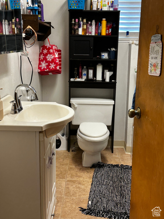 Bathroom featuring vanity and tile patterned flooring