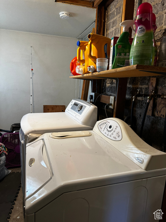 Laundry area featuring independent washer and dryer