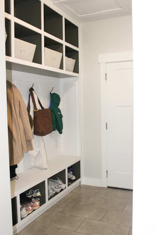 Mudroom featuring light tile patterned floors