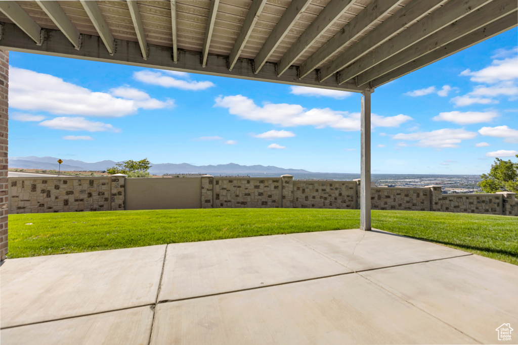 View of patio with a mountain view