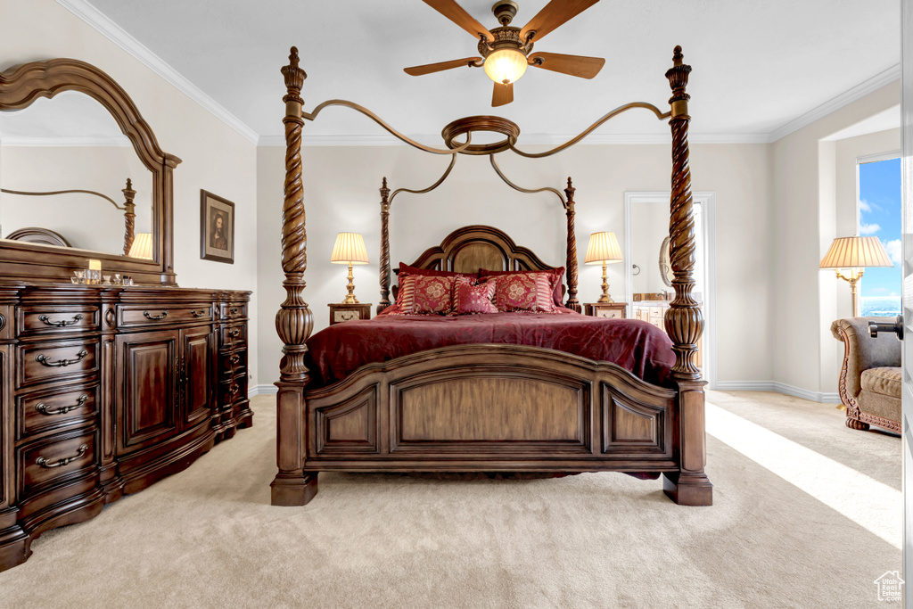 Bedroom with light carpet and ornamental molding