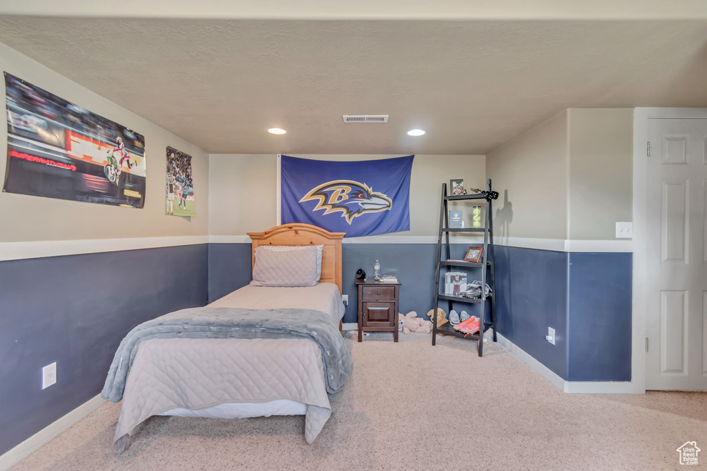 Bedroom featuring carpet and recessed lighting