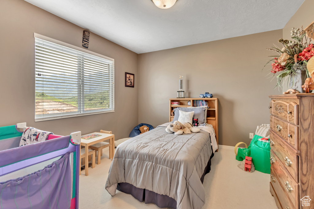 Bedroom featuring carpet floors