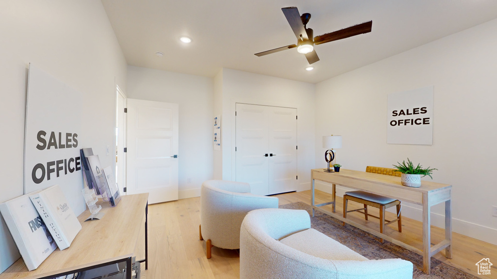 Office area with ceiling fan, light wood finished floors, and recessed lighting