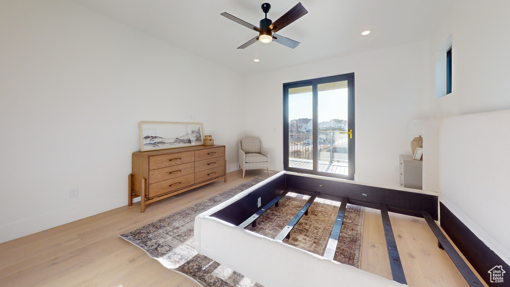 Bedroom featuring wood finished floors, recessed lighting, and ceiling fan
