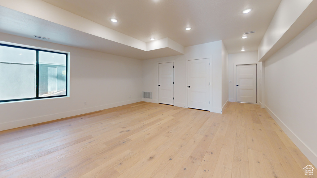 Unfurnished bedroom featuring light wood-type flooring and recessed lighting