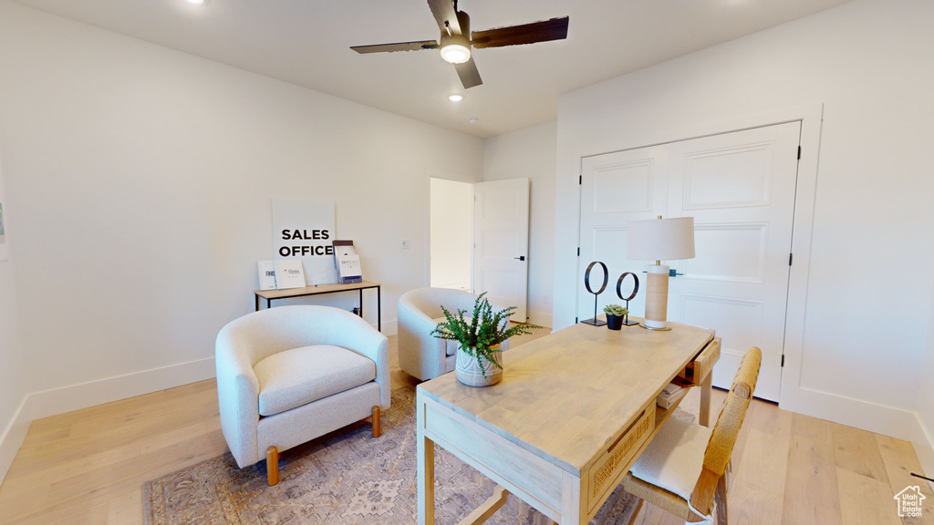 Office space with ceiling fan, light wood-type flooring, and recessed lighting