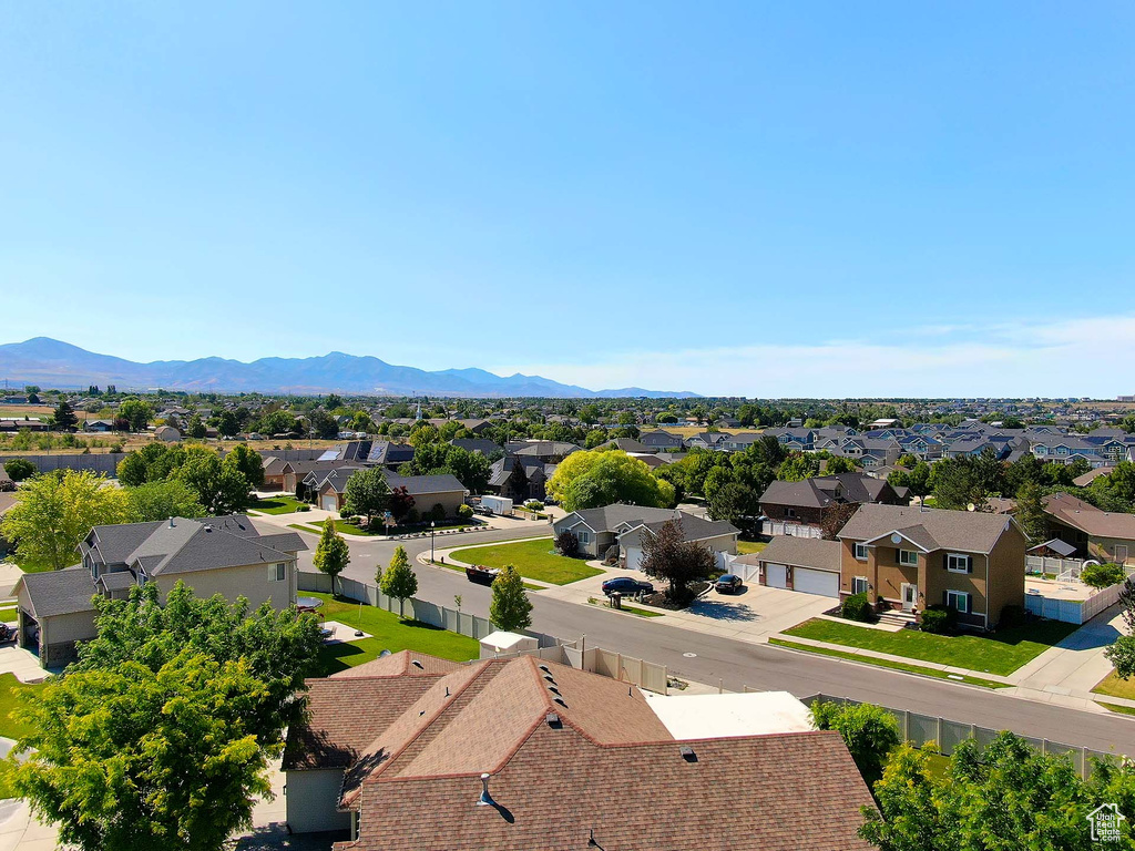 Aerial view of residential area with a mountain backdrop
