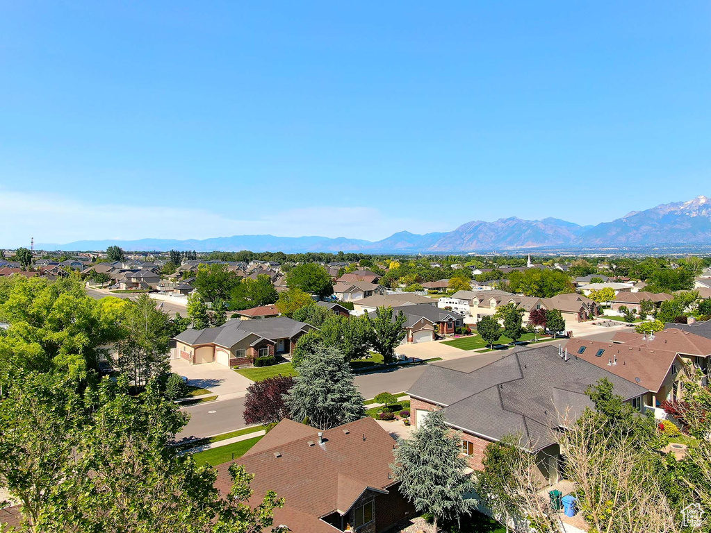Aerial perspective of suburban area featuring mountains