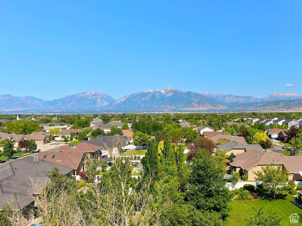 View of mountain backdrop with nearby suburban area