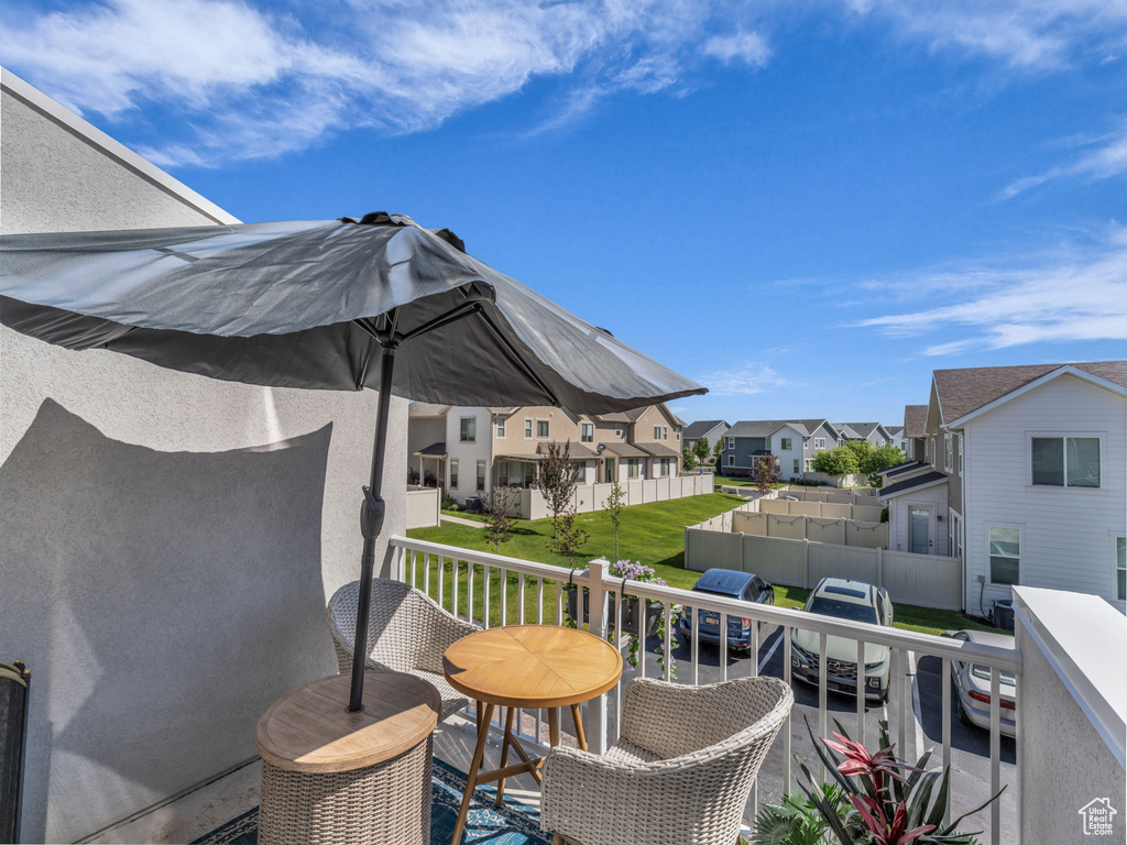 Balcony featuring a residential view and grilling area