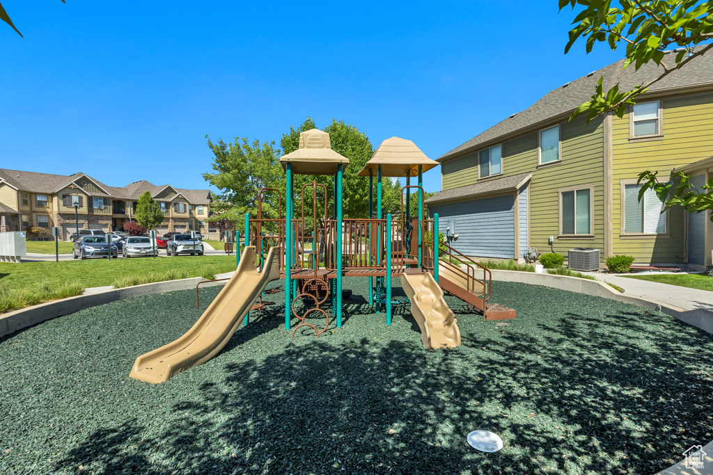Communal playground featuring a residential view