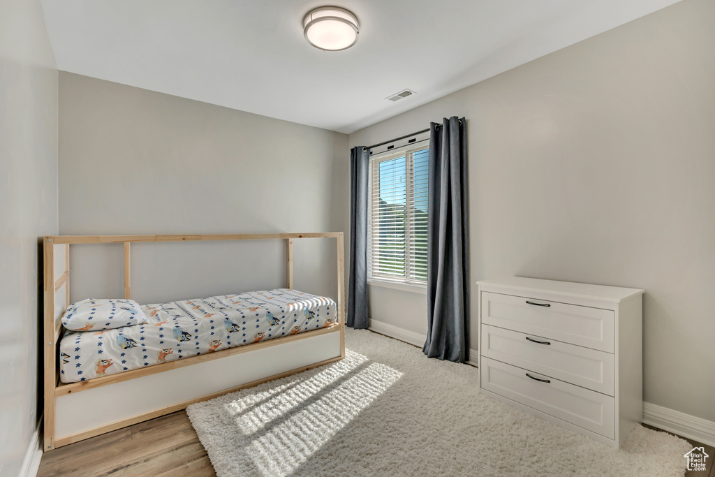 Bedroom featuring baseboards