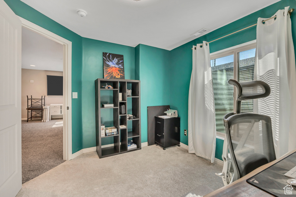 Office area with carpet floors and baseboards