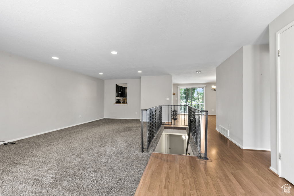 Spare room with recessed lighting and wood finished floors