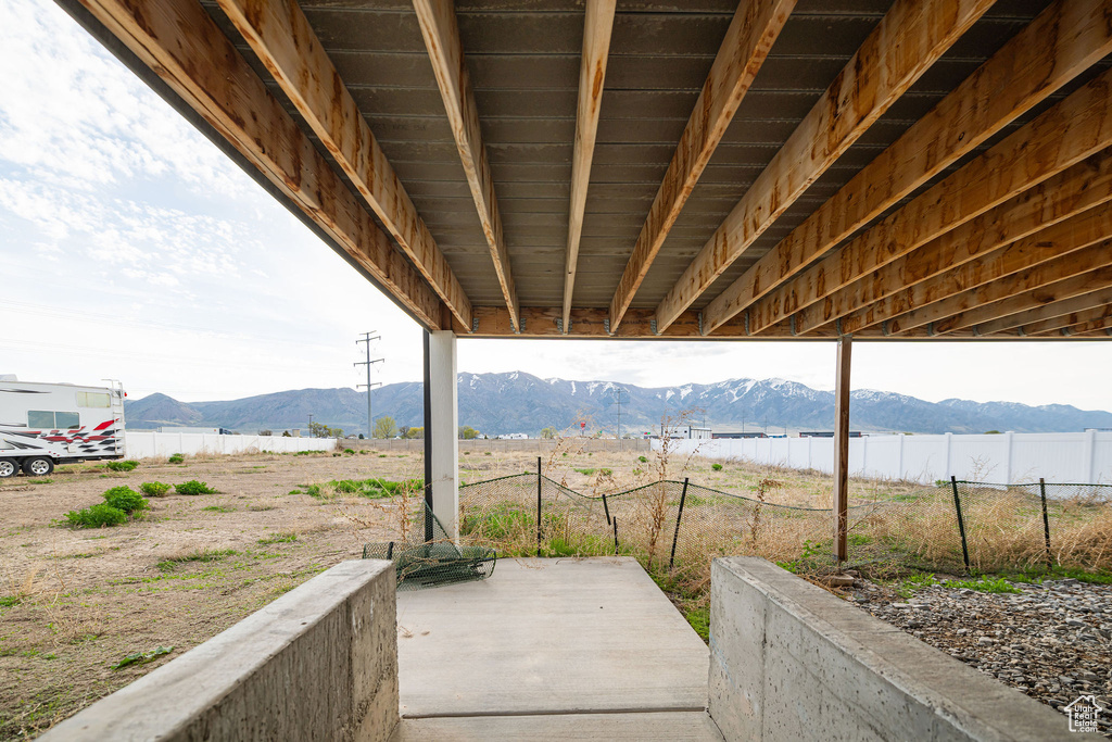 View of patio / terrace with a mountain view