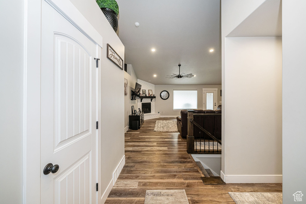 Corridor featuring recessed lighting and wood finished floors