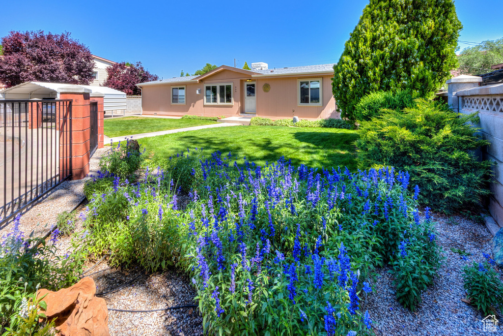 Rear view of house featuring stucco siding