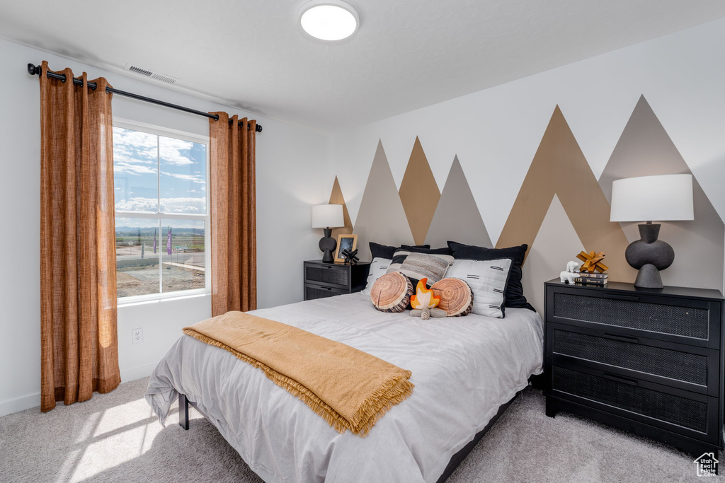 Bedroom with carpet floors