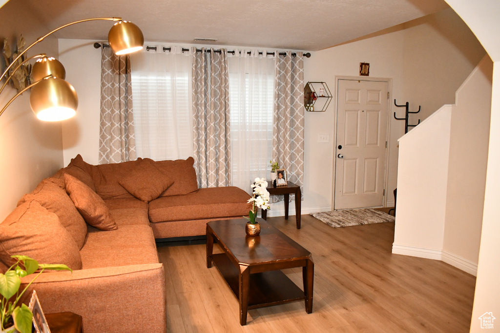 Living room with light wood finished floors
