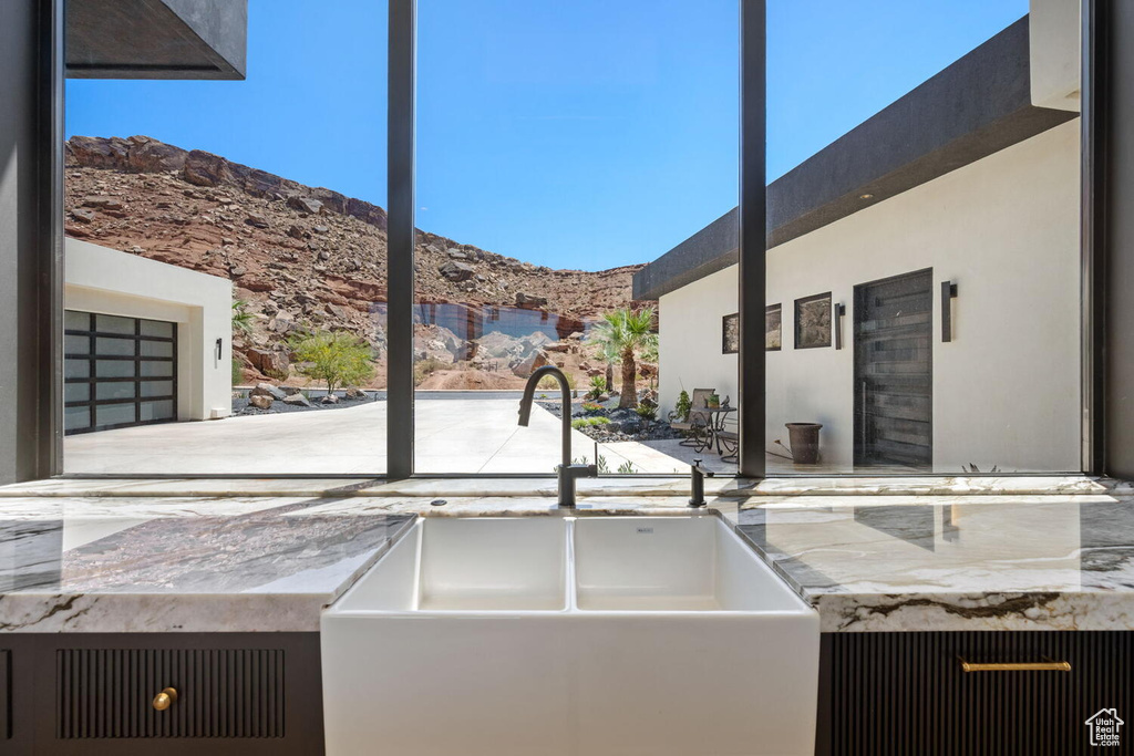 Kitchen featuring a mountain view and a high ceiling
