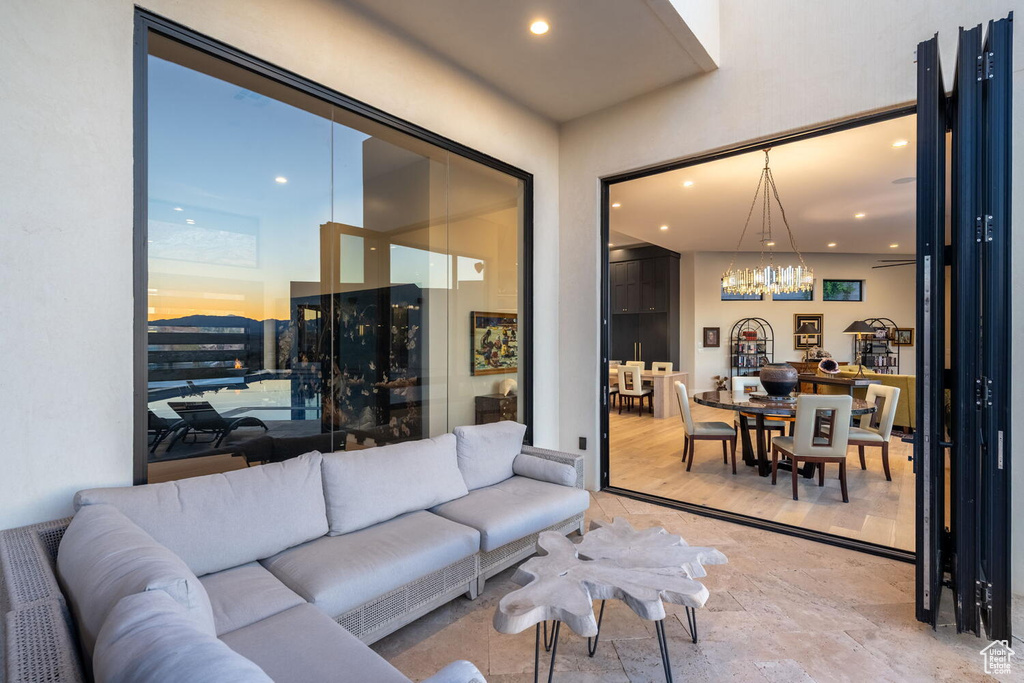 Living room featuring a chandelier and recessed lighting