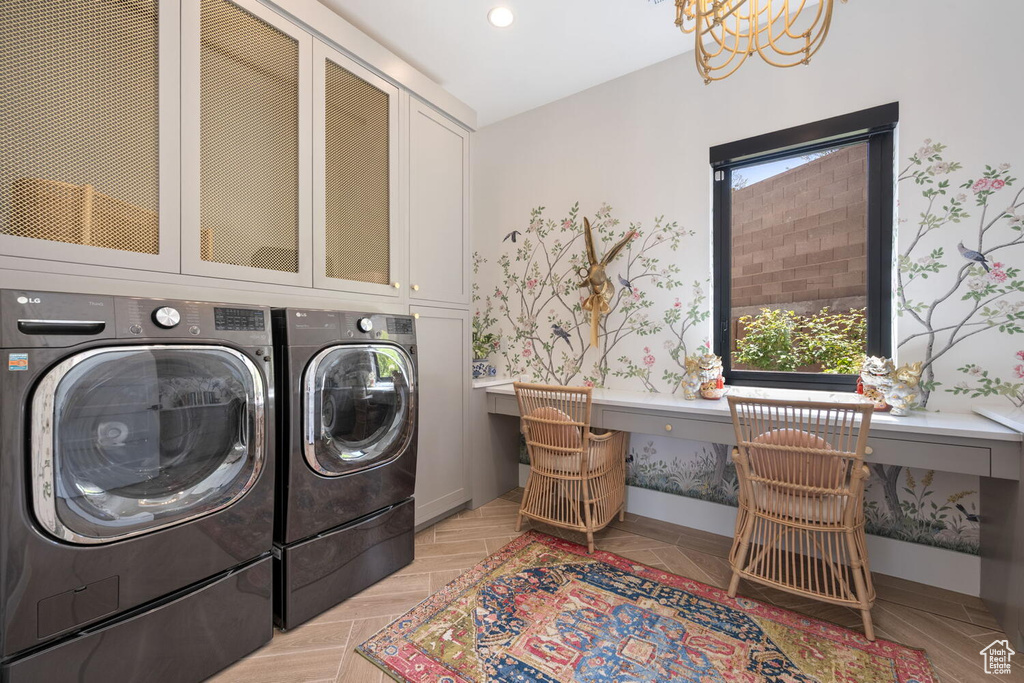 Laundry room with washer and dryer and cabinet space