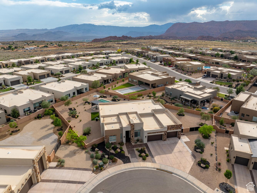 Aerial perspective of suburban area with mountains