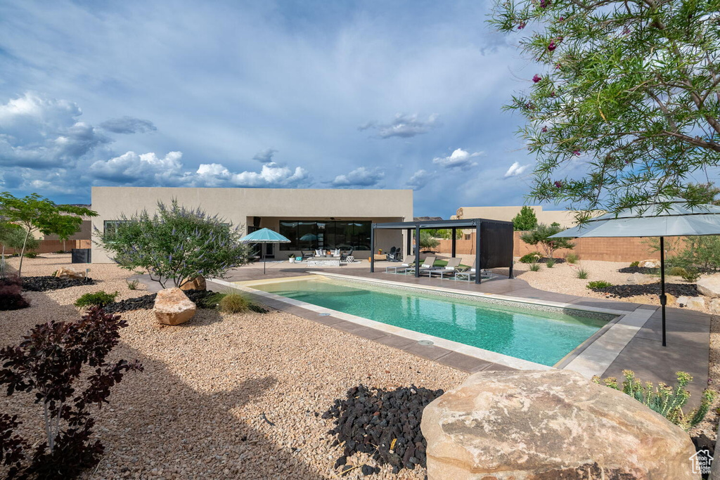 Outdoor pool featuring a patio area