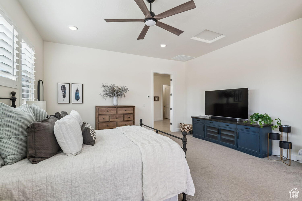 Carpeted bedroom featuring recessed lighting and ceiling fan