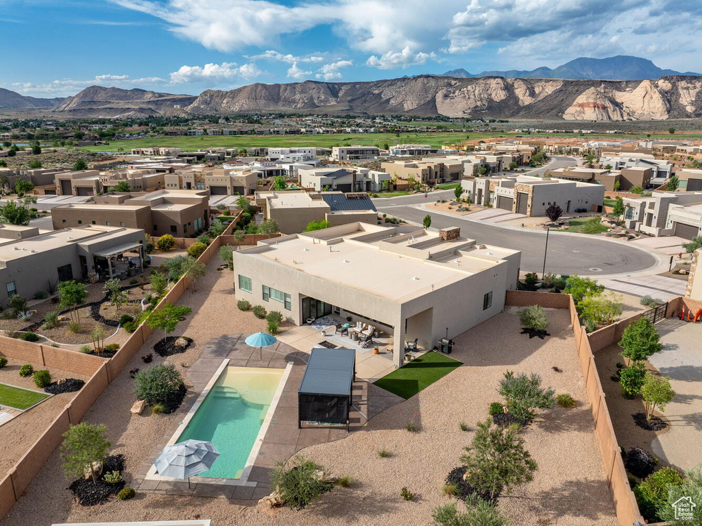 Aerial perspective of suburban area featuring mountains