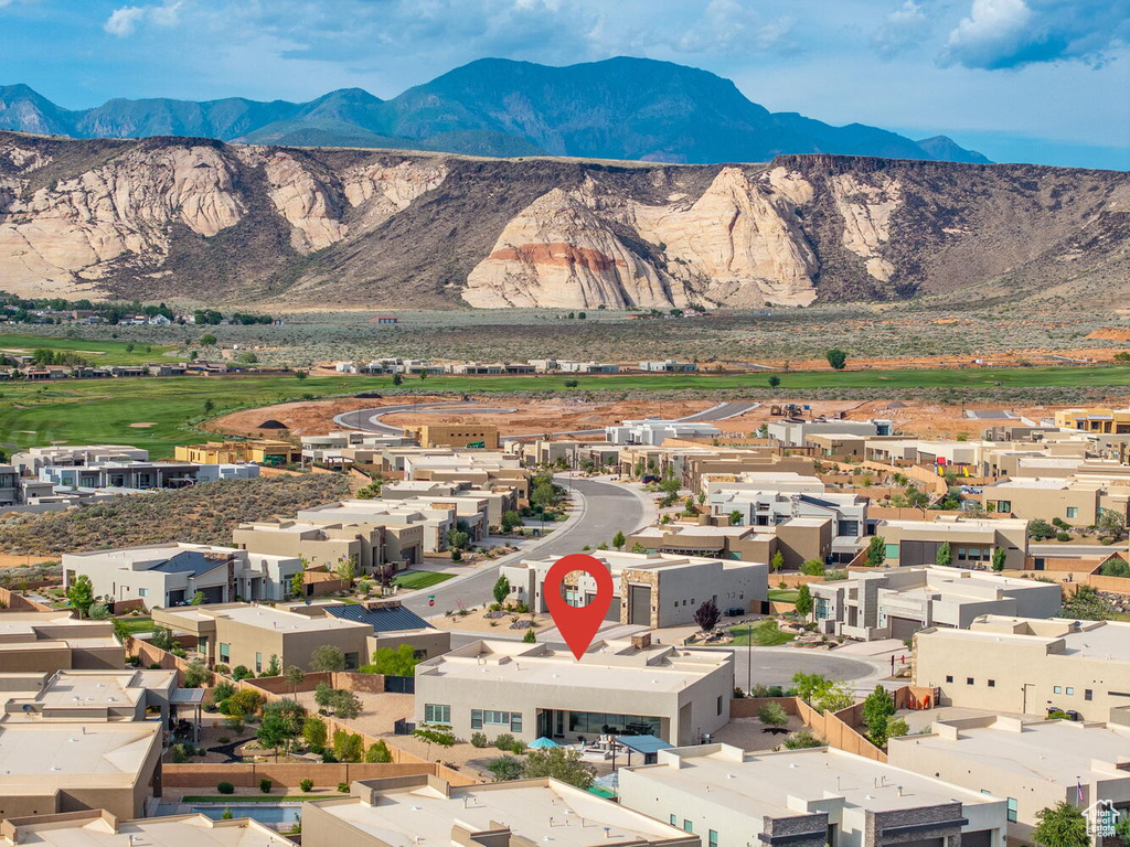 View of mountain background featuring nearby suburban area
