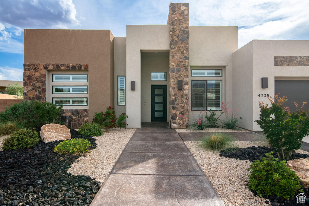 View of front of property with stucco siding