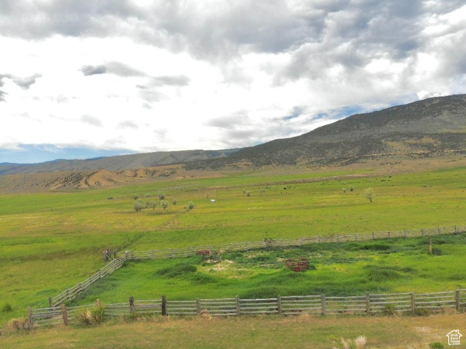 View of mountain background with rural landscape and a pastoral area