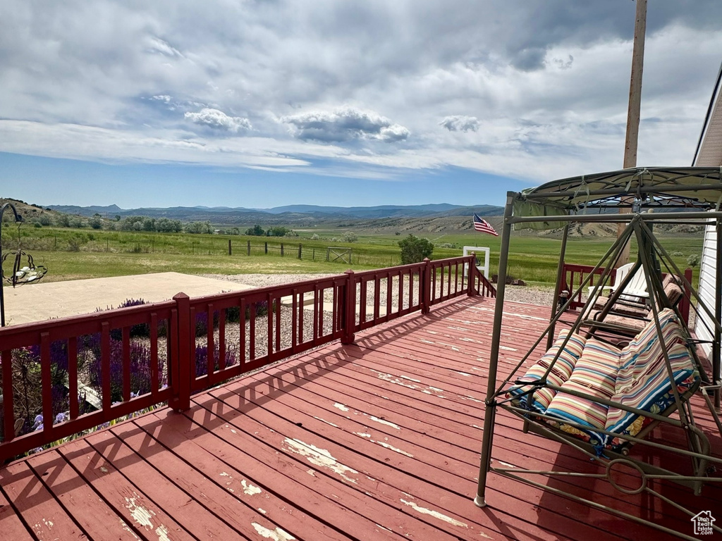 Deck featuring a view of rural / pastoral area