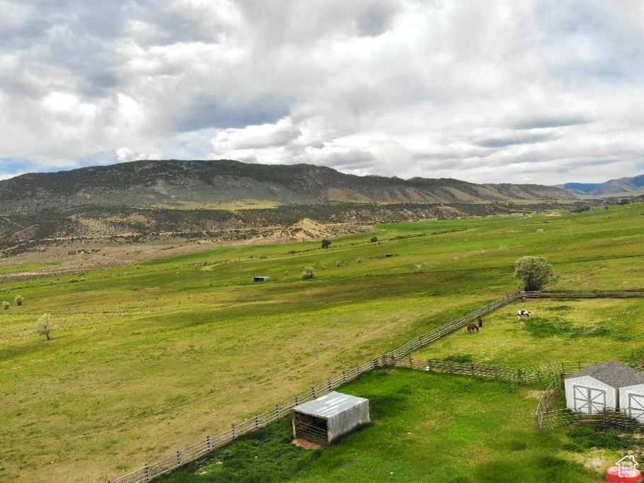 View of mountain background featuring rural landscape and a pastoral area
