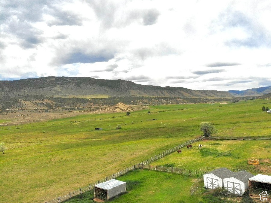 View of mountain background featuring rural landscape and agricultural land