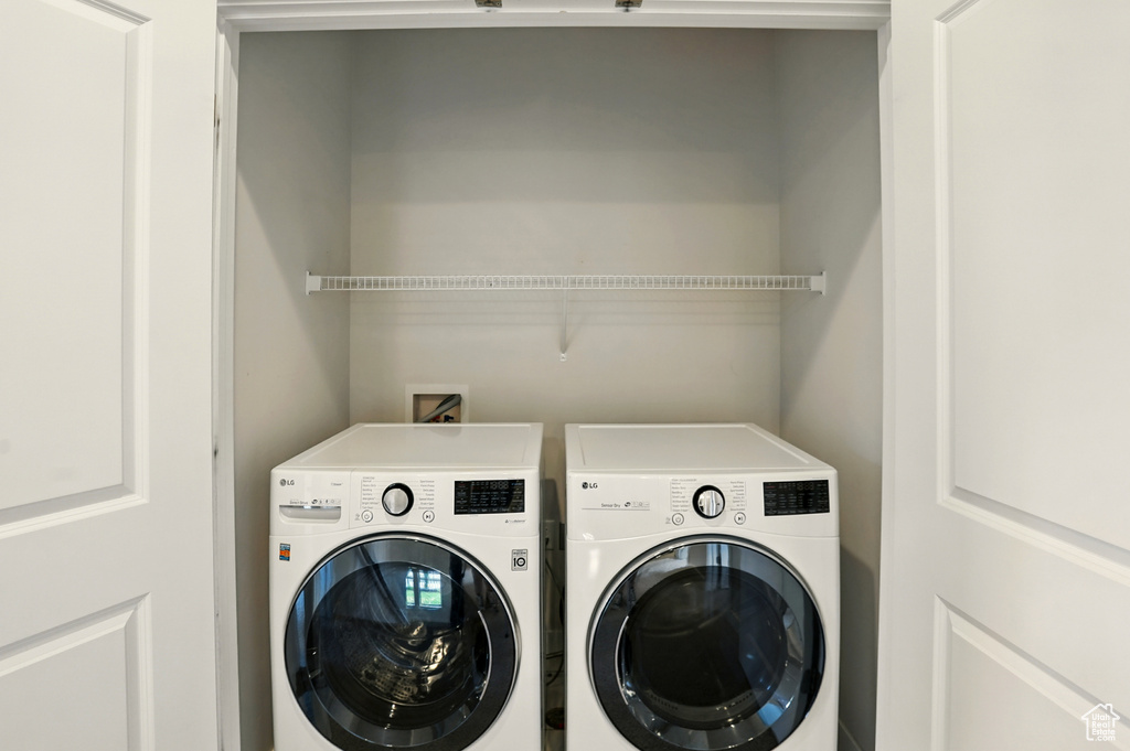Laundry area featuring separate washer and dryer