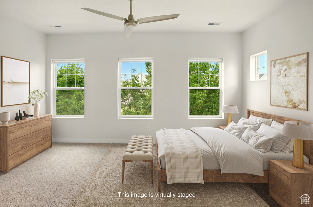 Bedroom featuring carpet and a ceiling fan