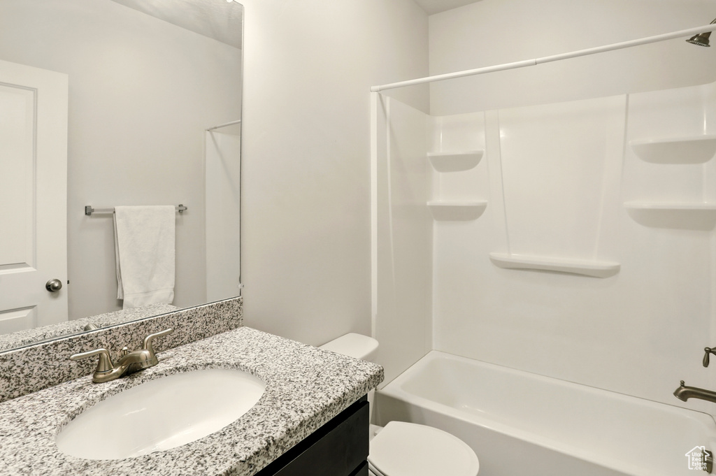 Full bathroom with vanity and tub / shower combination